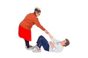 person helping someone on the ground