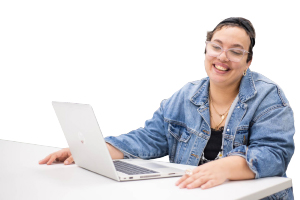 person sitting at a desk with a laptop