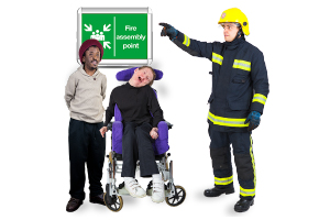 people meeting at an emergency point and being directed by a fireman