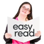 picture of a woman reading an easy read fact sheet