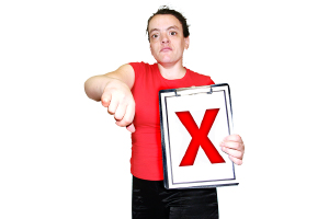 person holding a clipboard with a red x doing a thumbs down