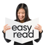 woman reading an easy read fact sheet