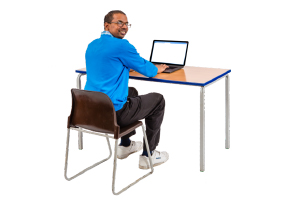 person using a computer at a desk