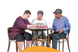 people learning around a table