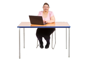 person using a laptop at a table