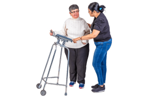 person using a walker with a supporter