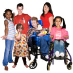 picture of six children and young people, two of them in wheelchairs